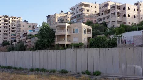 palestine anata refugges camp behind concrete wall -aerial