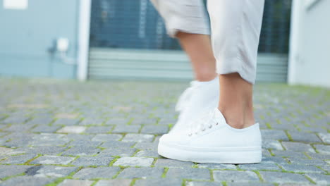 Happy-dancer-woman,-sneakers-feet