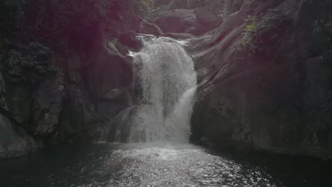 hidden waterfall in lush forest paradise