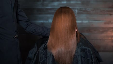 long straight red hair treatment at a hair salon