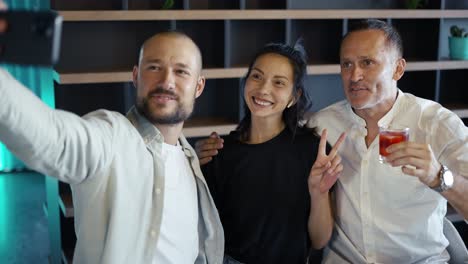 POV-of-Happy-business-team-take-a-selfie-during-lunch