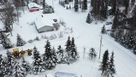 Drone-video-captures-the-power-and-a-snow-plow-in-action-as-it-clears-snow-in-the-winter-wonderland-of-Alaska