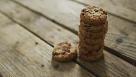 video of biscuits with chocolate on wooden background