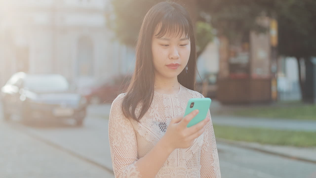 Asian woman with a phone