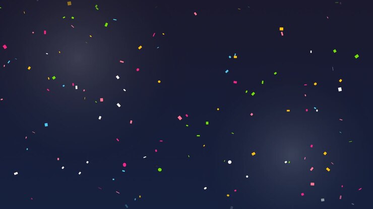 Colorful Confetti Falling Against a Dark Background