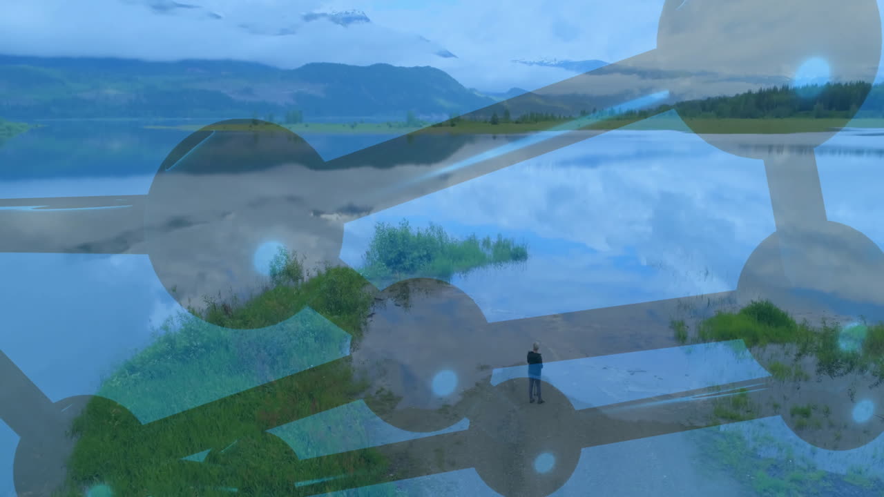 woman standing on lakeshore path, viewing animated technology network nodes connecting across water