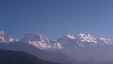 landscape view of snow covered mountain in lamjung, nepal.