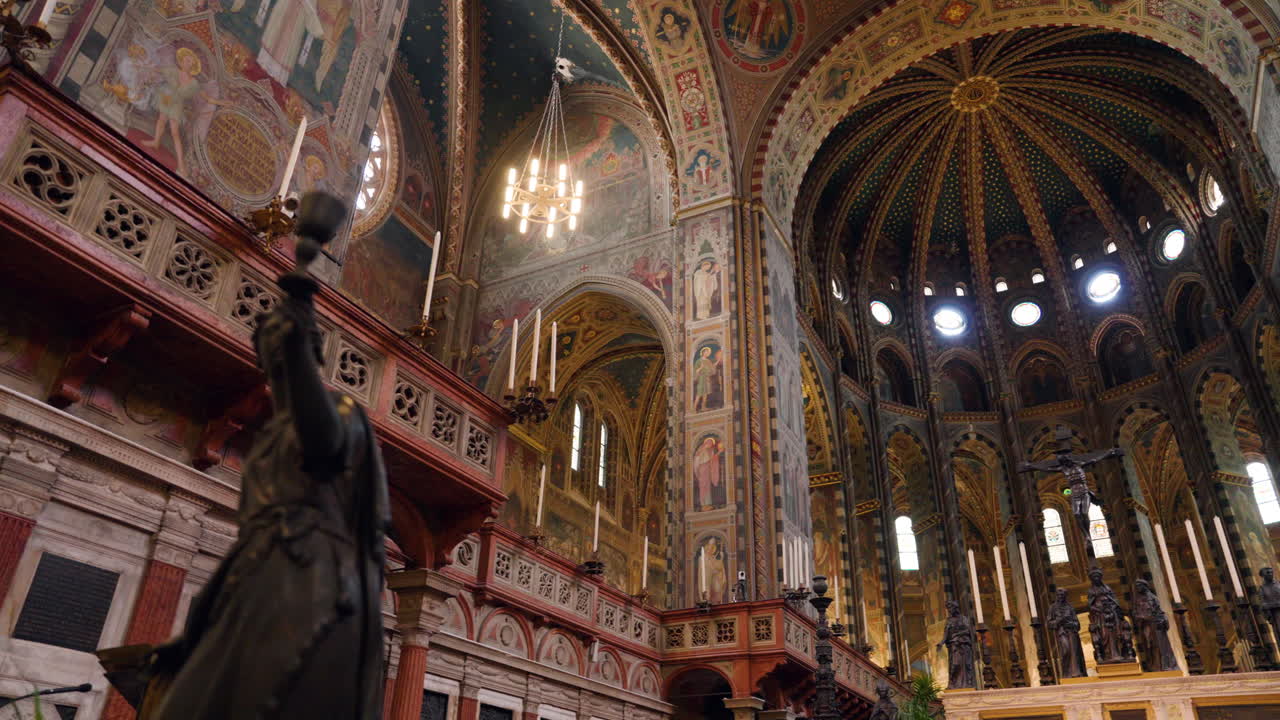 Basilica of Saint Anthony of Padua Interior With Frescoes, Chandeliers, And Dome In Italy. - pan shot