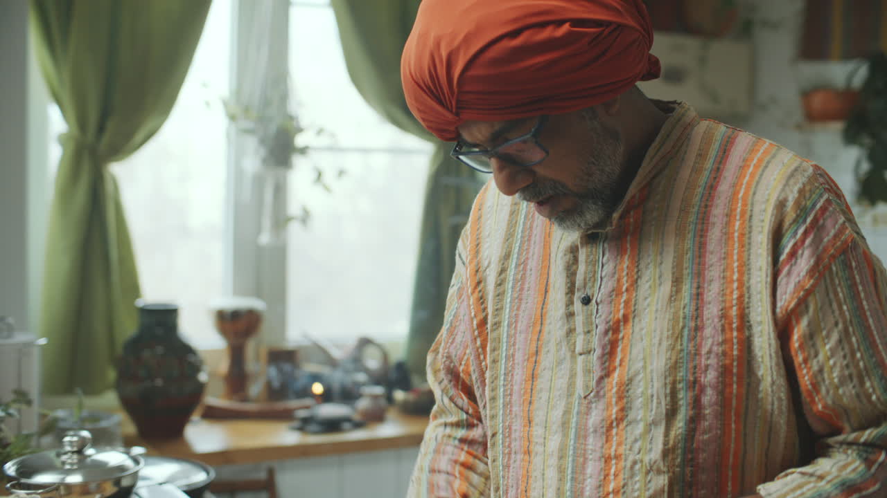 Indian Food Blogger Kneading Dough and Telling Recipe on Camera in Kitchen