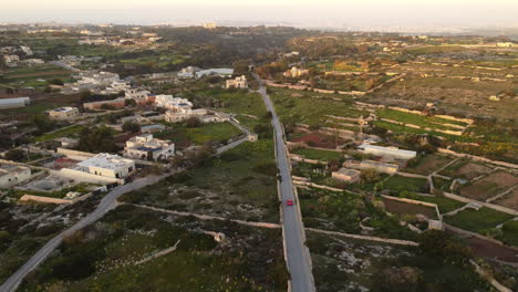 4k-Sunset-Drone-footage--following-red-car