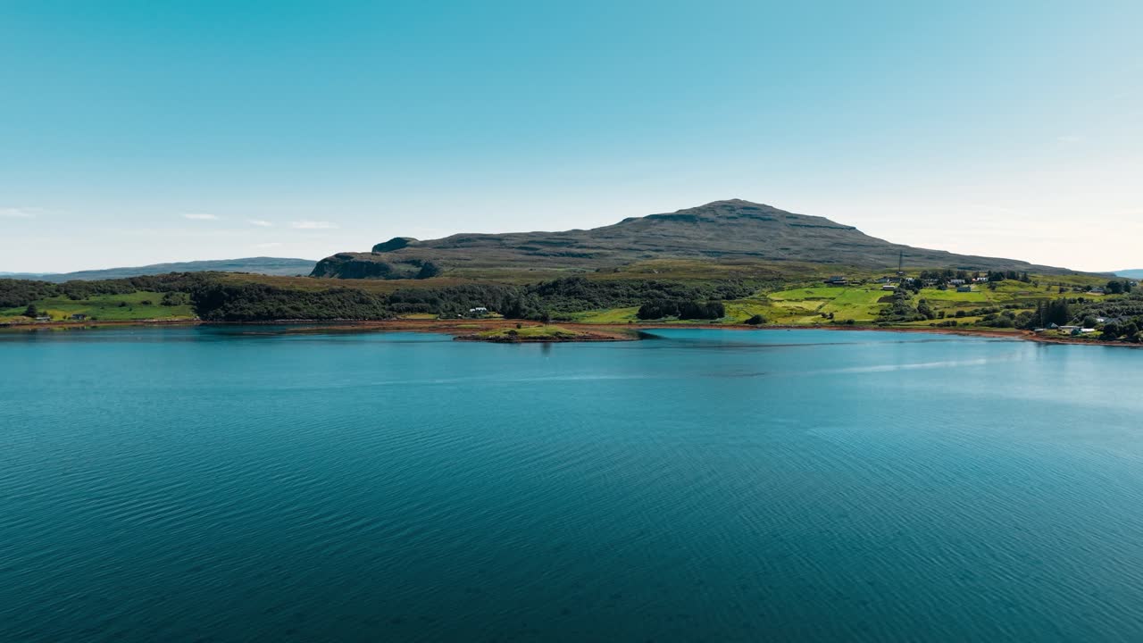 Scenic landscape featuring a lake and mountain