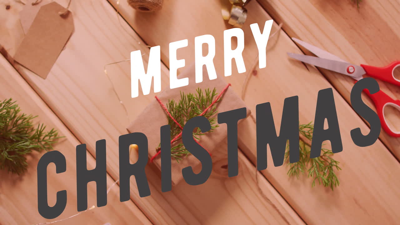 Merry Christmas text animation over holiday gift wrapping on wooden table