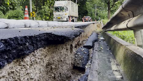 flood damaged road in northern thailand caused by heavy rain