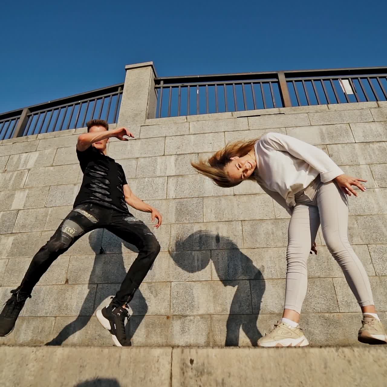 Dancing couple in city
