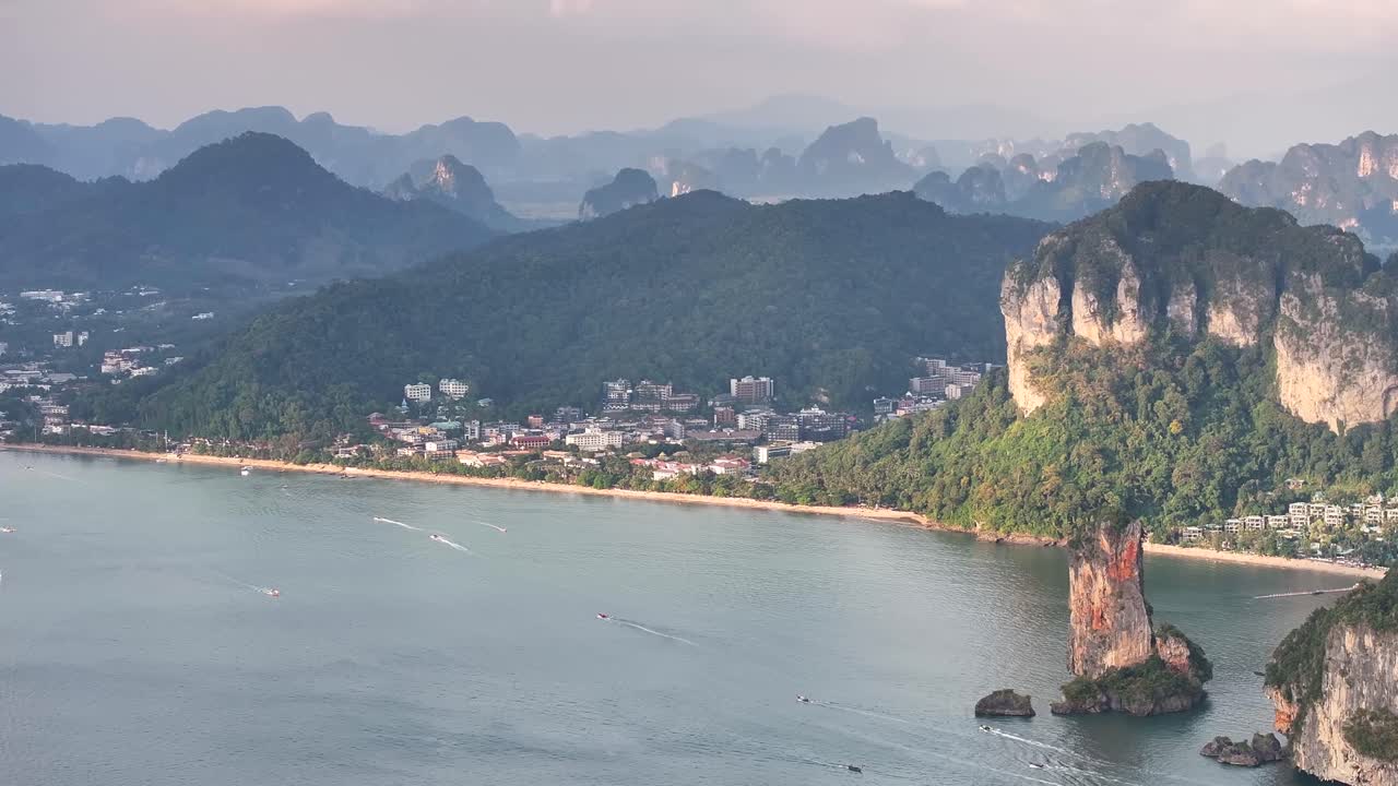 Ao Nang beach and mountain backdrop, amazing natural landscape of Krabi, Thailand.