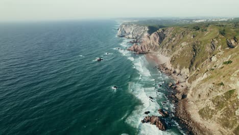 coastal cliffs and waves aerial view