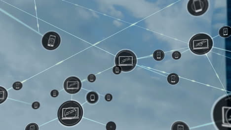 red de iconos digitales contra nubes en el cielo azul