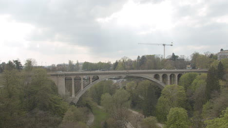 Traffic-driving-over-distant-Adolphe-Bridge-in-Luxembourg