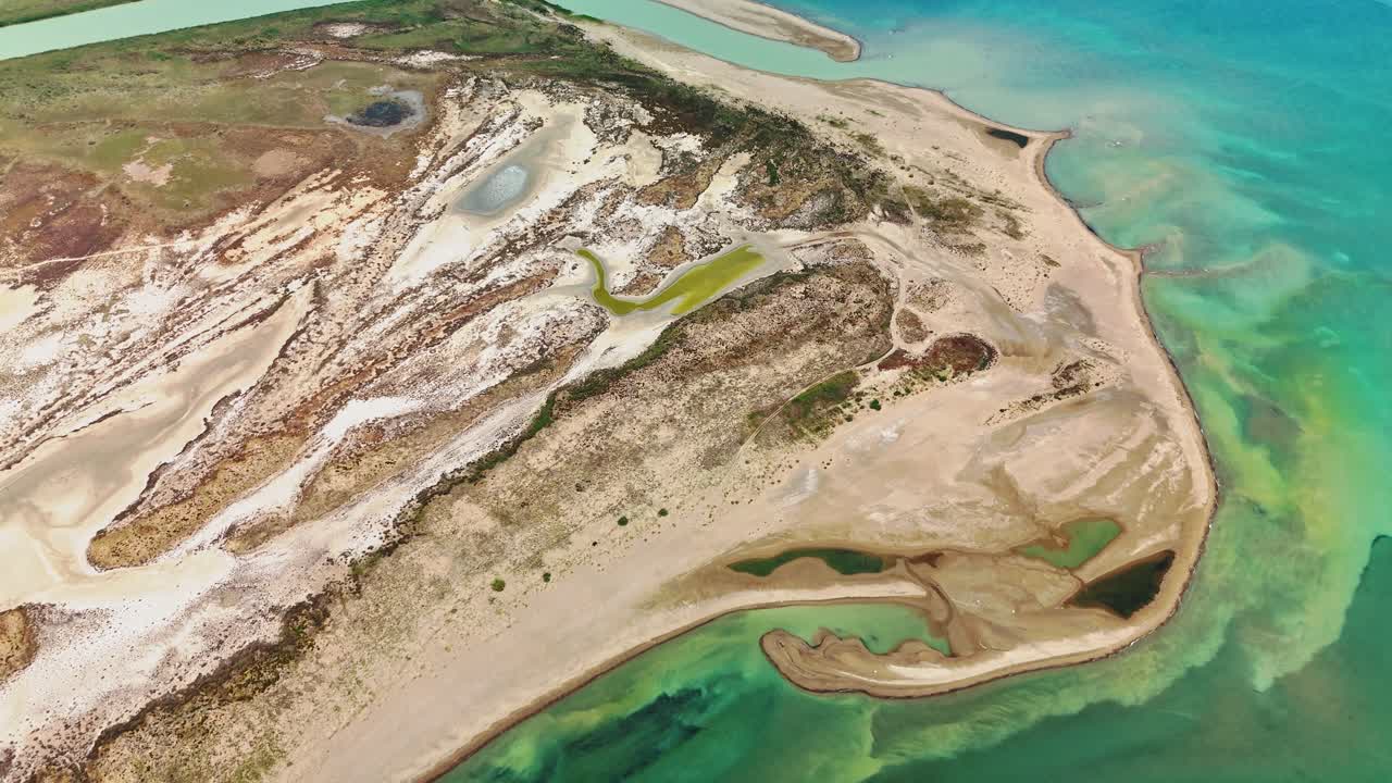 Aerial view of stunning turquoise coastline, serene and expansive landscape