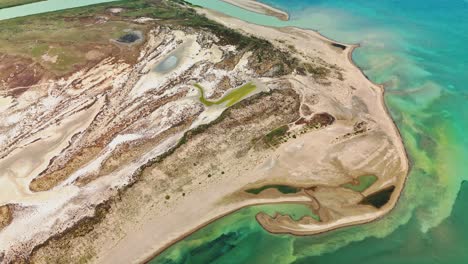 aerial view of stunning turquoise coastline, serene and expansive landscape