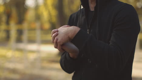 Man warming up in a park