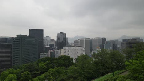 Drone-shot-flying-close-to-skyscrapers-in-the-city-of-Seoul-in-South-Korea