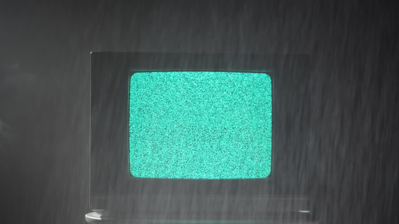 Vintage TV with Static and Rain