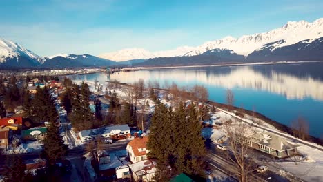 4k drone video of homes in seward, alaska during winter