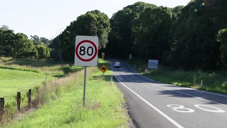 cars moving along a scenic rural highway