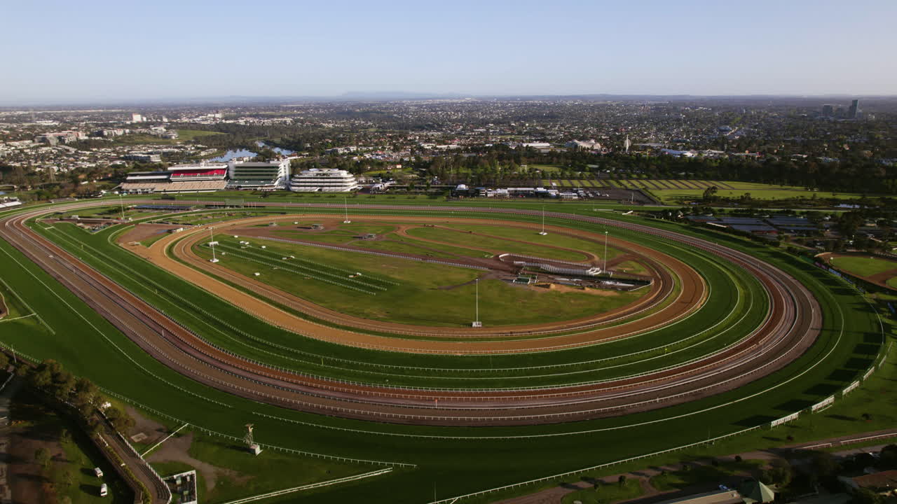 Aerial tilt shot ascending in front of the Flemington Racecourse, in Melbourne
