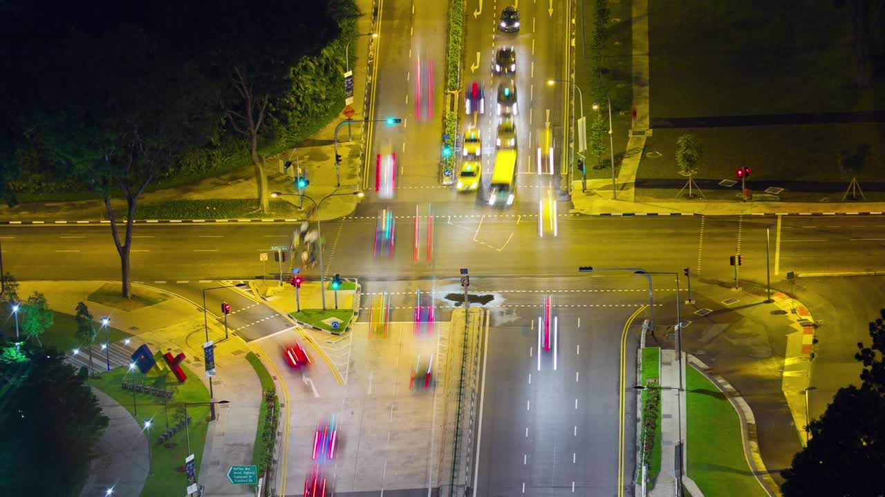 la ciudad de singapur luz nocturna de tráfico cruce de carreteras techo vista de la calle 4k lapso de tiempo