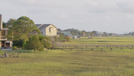 marsh and houses at magic hour