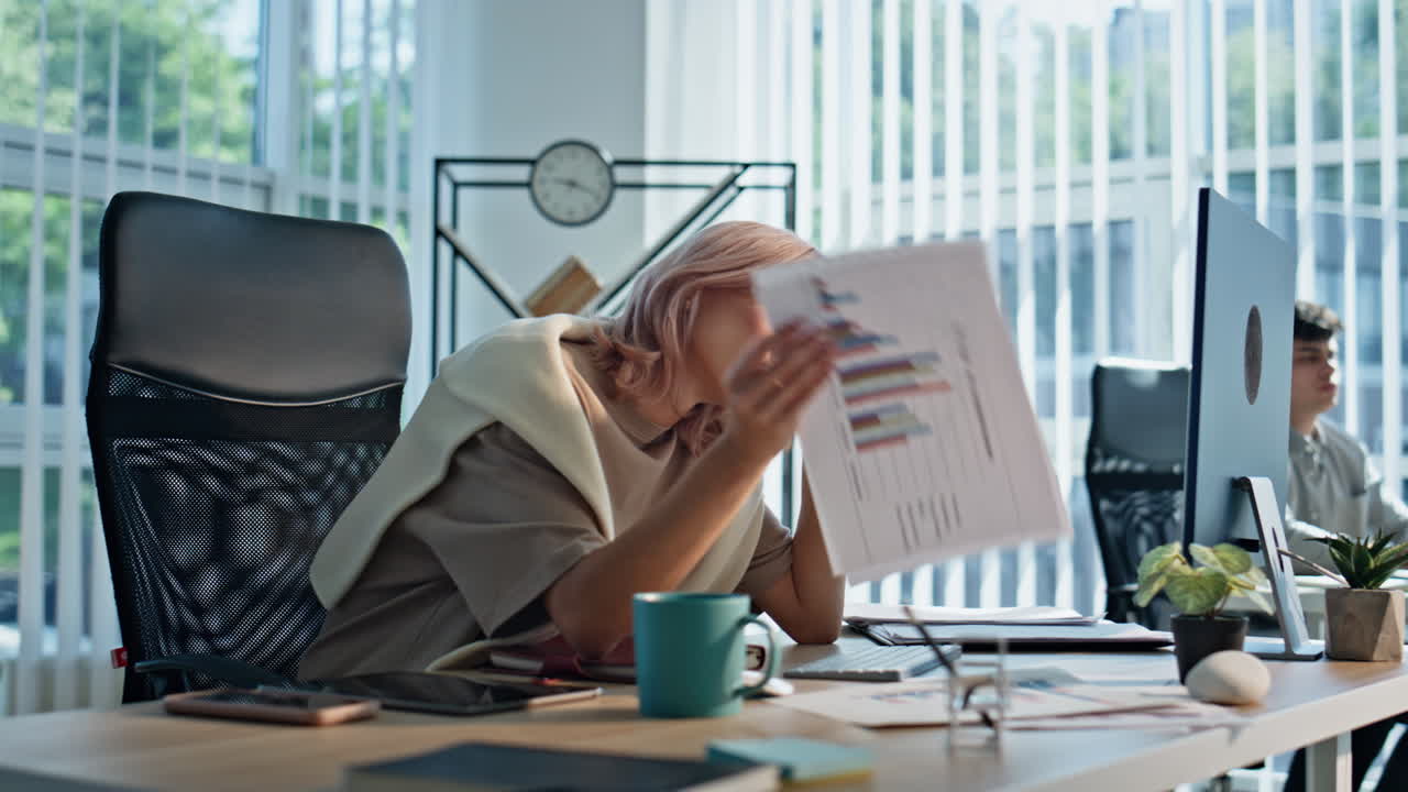 Tired business lady sitting workplace closeup. Bored businesswoman looking pc
