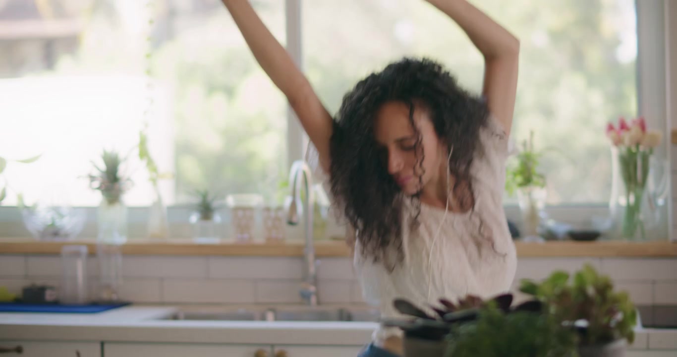 Woman full of joy and happiness dancing