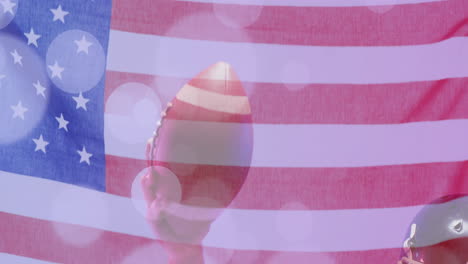 animation of caucasian american football player holding ball and flag of usa