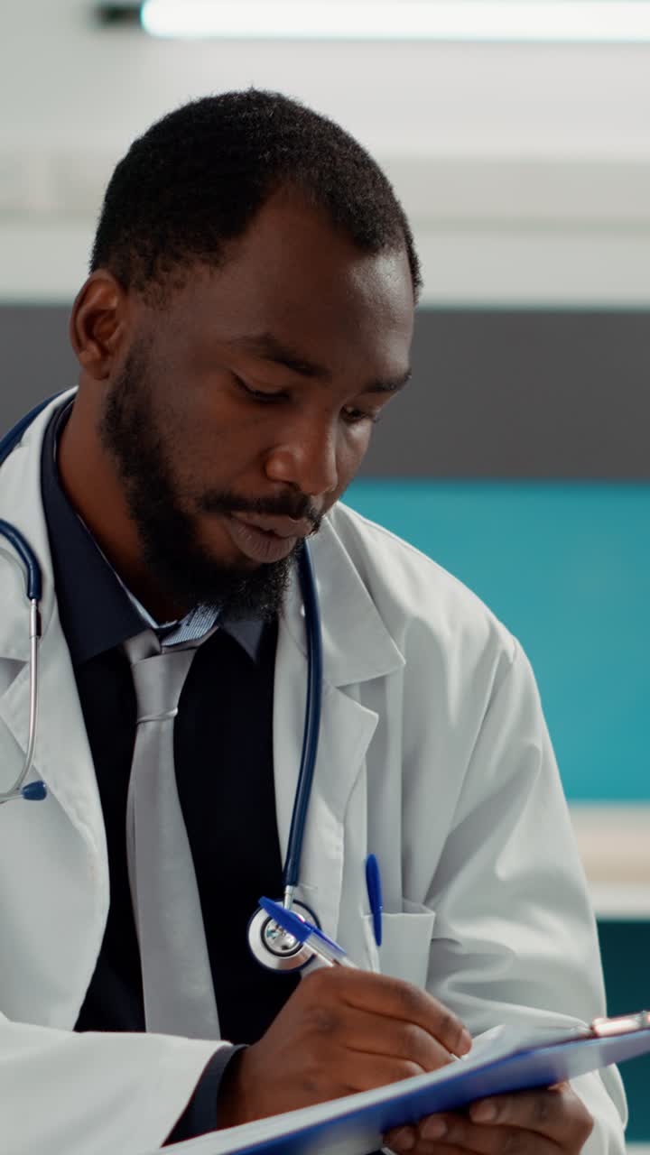 Doctor Writing on Clipboard