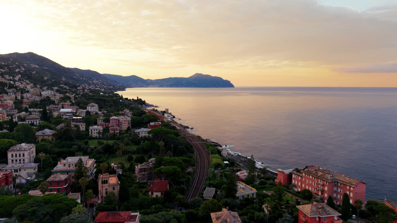Peaceful Genoa Italy sunset, colorful town, sea and mountains background