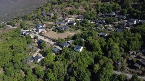 aerial view of a rural village in the mountains in benuza-4