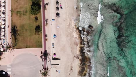 Top-Down-Aerial-View-of-Beach-and-Promenade-in-Cala-Millor-Mallorca-Island-Spain