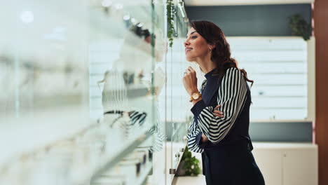 woman shopping for jewelry in a store