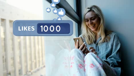 Woman-sitting-on-a-window-sill-texting