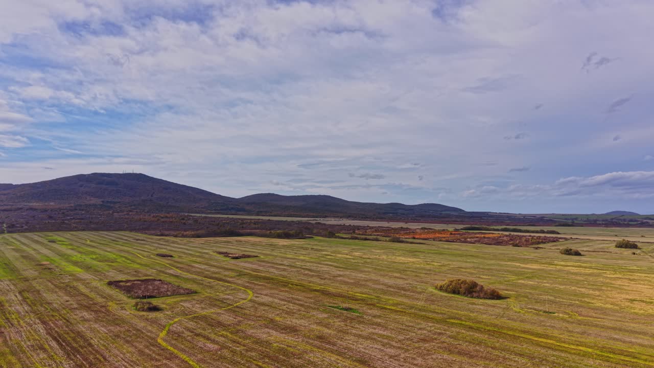 Expansive aerial view of Bulgarian countryside with rolling hills