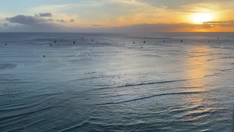 People-Surfing-And-Sailing-Over-Waikiki,-Honolulu,-Hawaii