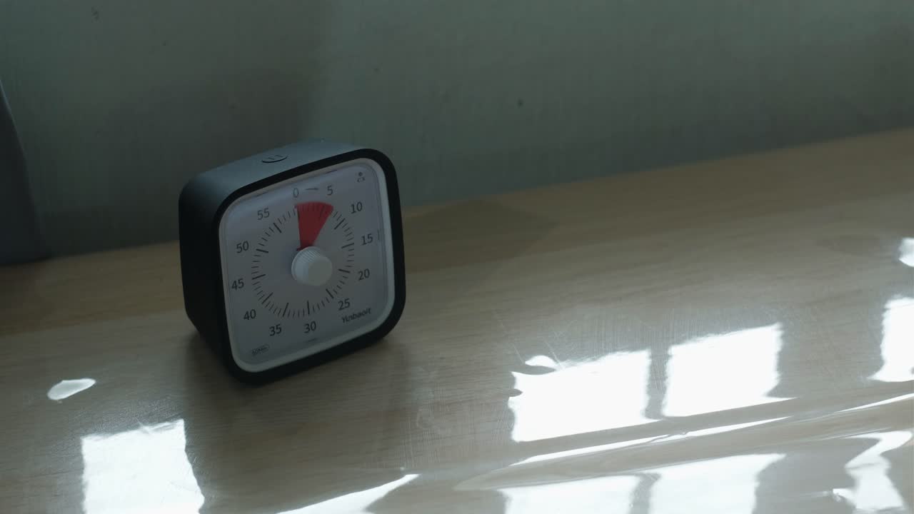 Setting Analog Timer To Five Minutes. closeup shot