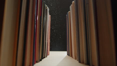 bookshelf with dust and light