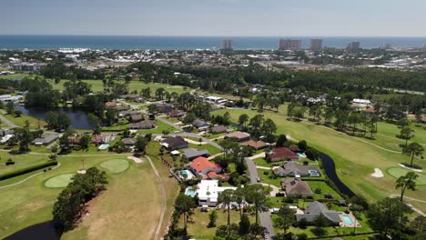 golf course with vacation houses on coastline of panama city in florida, usa