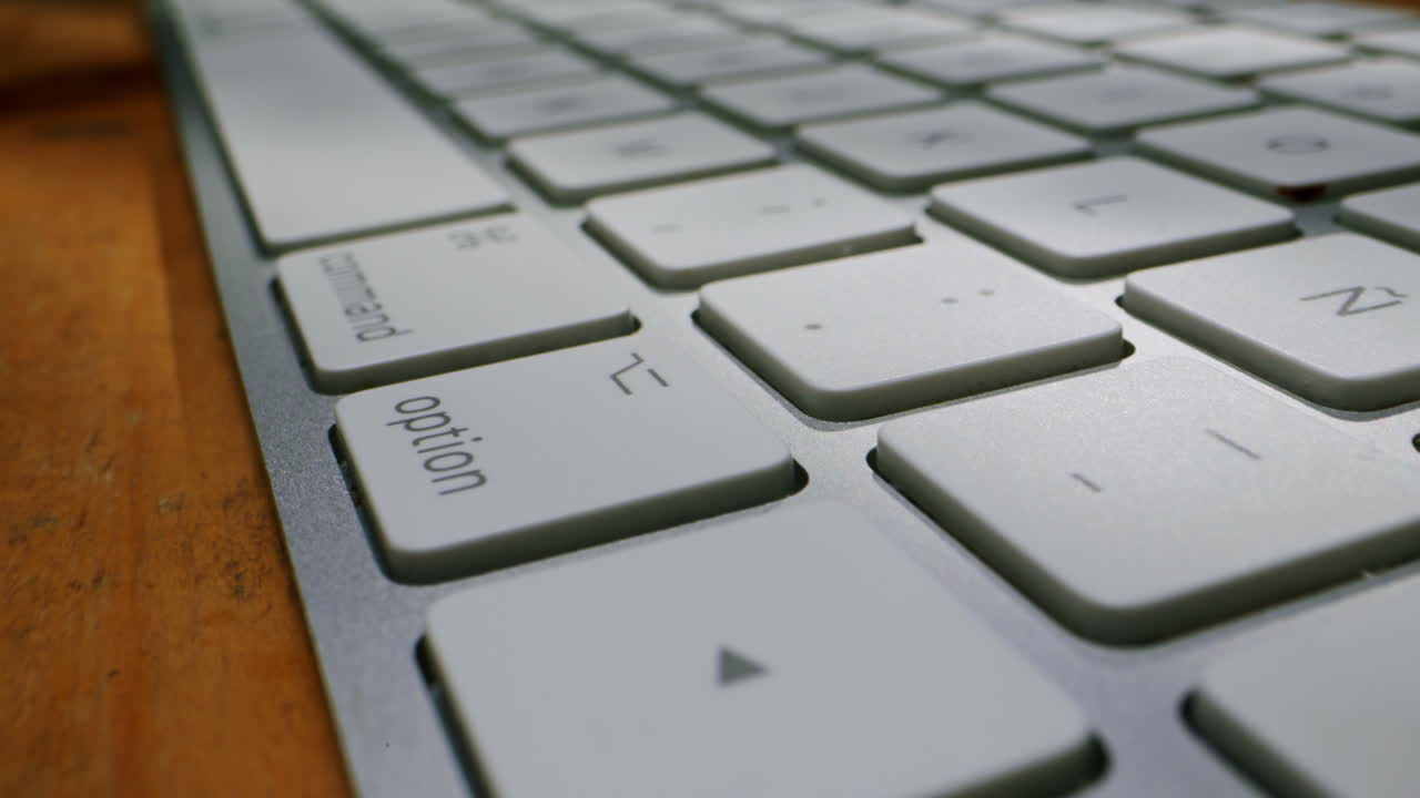 This is a detailed view of a sleek, modern keyboard that showcases its smooth keys and elegant overall design
