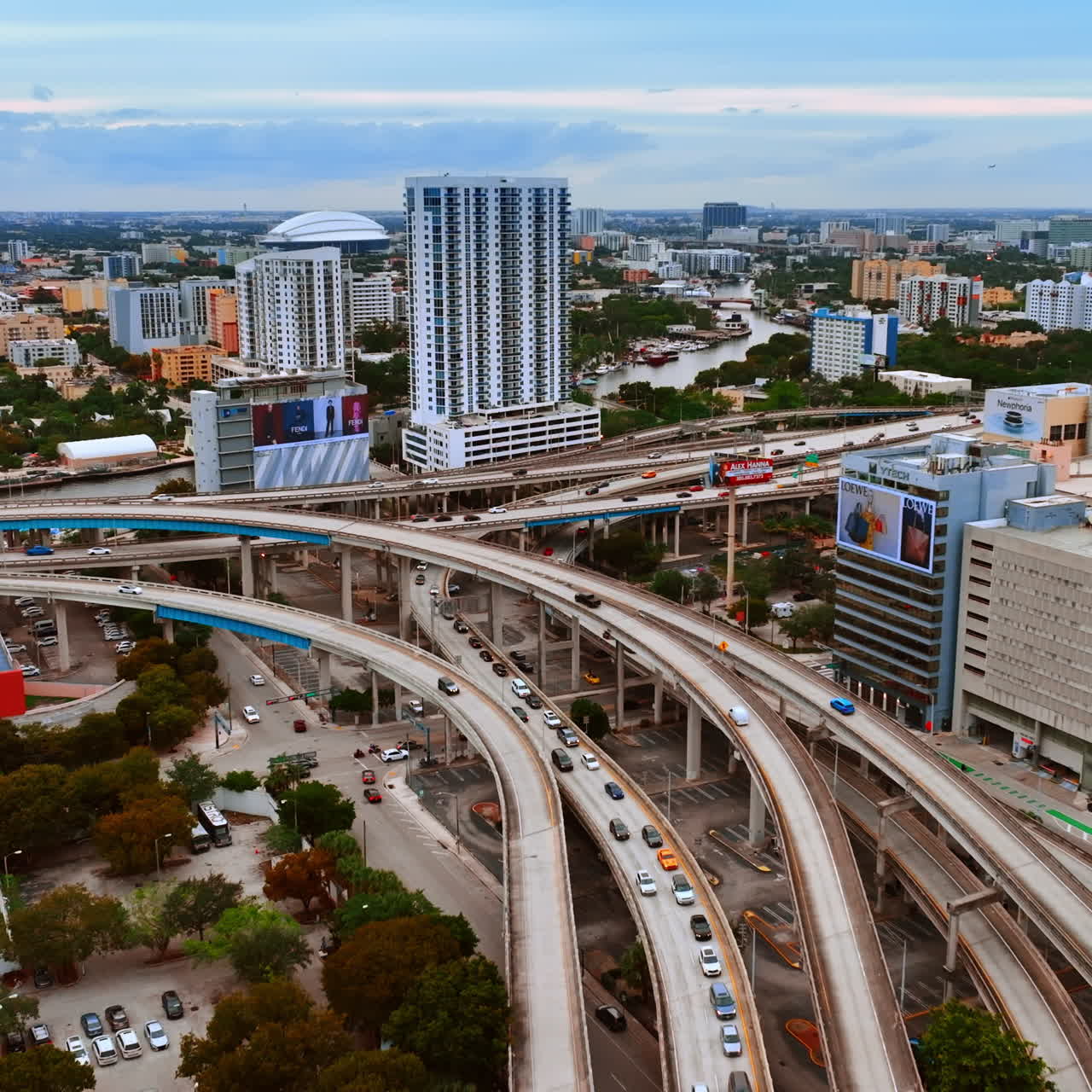 Transport going by the freeways in the city center. Panorama Miami, Florida, USA from aerial perspective.