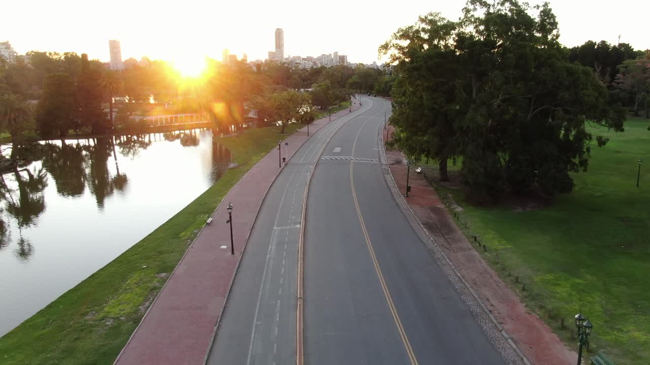 Empty city street in Argentina at sunset, showcasing quiet urban architecture and serene ambiance