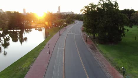 empty city street in argentina at sunset, showcasing quiet urban architecture and serene ambiance